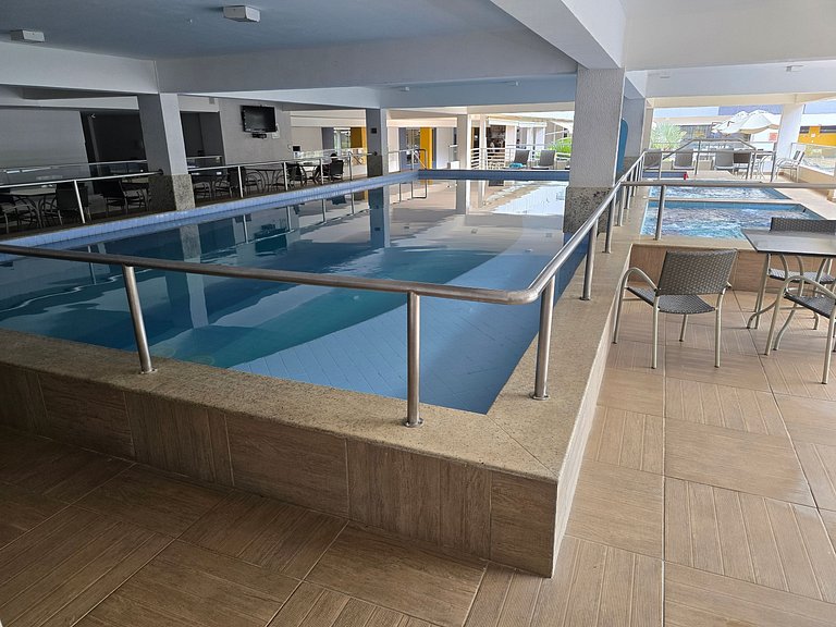 Apto Rio Quente - Vista piscina e ar cond na suíte